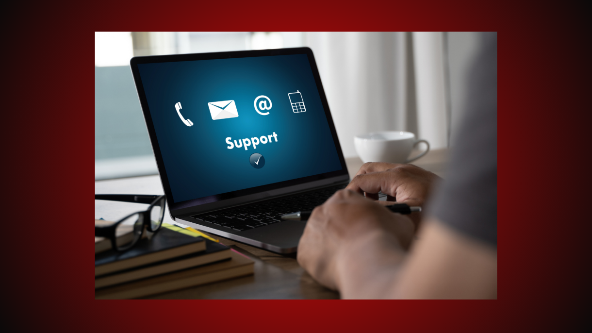 Person on a laptop on a support page.